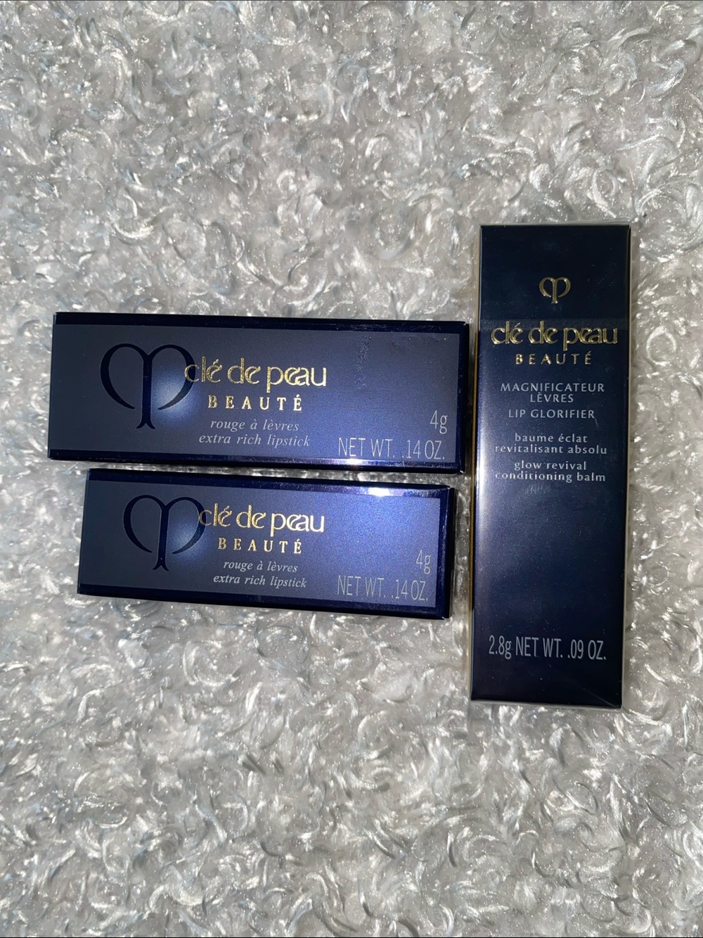 Bundle of Cle de peau lipstick and lip
Conditioning balm